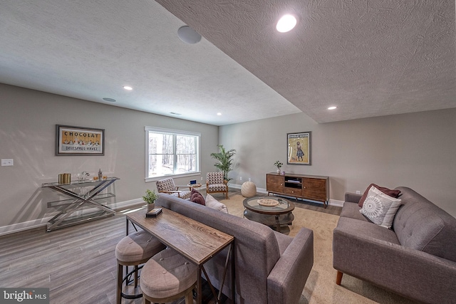 547 Webb Rd # Ad, Chadds Ford, PA 19317 - living area with recessed lighting, baseboards, a textured ceiling, and wood finished floors