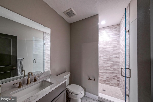 547 Webb Rd # Ad, Chadds Ford, PA 19317 - bathroom with toilet, a stall shower, vanity, tile patterned floors, and a textured ceiling