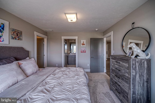 547 Webb Rd # Ad, Chadds Ford, PA 19317 - bedroom with carpet floors, connected bathroom, baseboards, and a textured ceiling