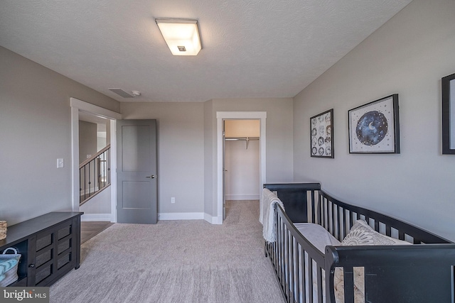 547 Webb Rd # Ad, Chadds Ford, PA 19317 - bedroom with carpet floors, baseboards, a spacious closet, a closet, and a textured ceiling