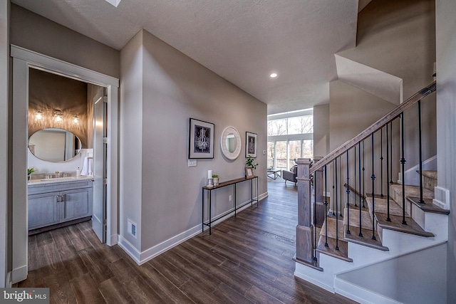 547 Webb Rd # Ad, Chadds Ford, PA 19317 - hallway featuring dark wood-style floors, stairway, baseboards, and recessed lighting
