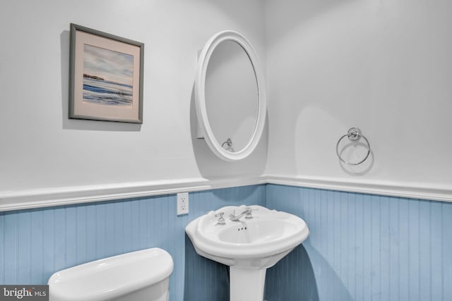 1749 Carrolls Tract Rd, Orrtanna, PA 17353 - bathroom with wainscoting, toilet, and a sink