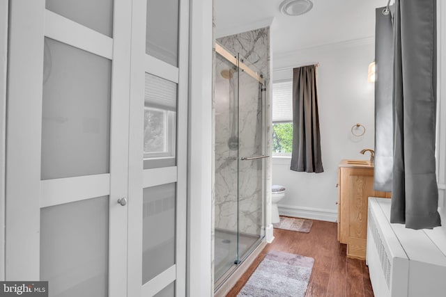 1749 Carrolls Tract Rd, Orrtanna, PA 17353 - full bath with a marble finish shower, toilet, wood finished floors, radiator, and ornamental molding
