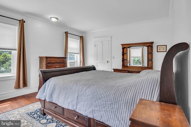 1749 Carrolls Tract Rd, Orrtanna, PA 17353 - bedroom with multiple windows, crown molding, and wood finished floors