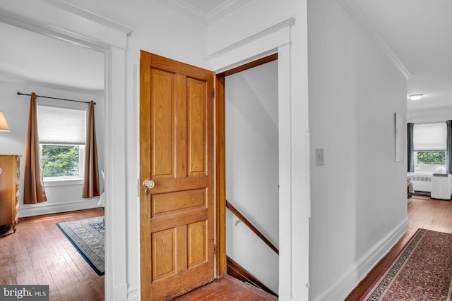 1749 Carrolls Tract Rd, Orrtanna, PA 17353 - hallway with radiator heating unit, wood-type flooring, ornamental molding, an upstairs landing, and baseboards