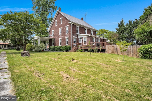 1749 Carrolls Tract Rd, Orrtanna, PA 17353 - rear view of property with brick siding, a chimney, and a wooden deck
