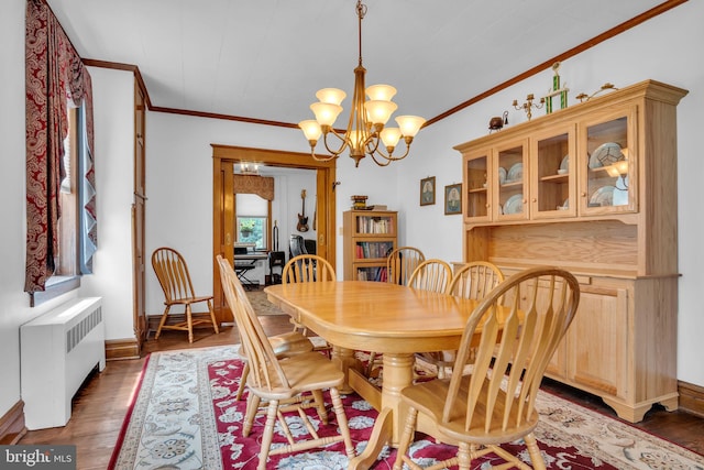 1749 Carrolls Tract Rd, Orrtanna, PA 17353 - dining area with radiator heating unit, crown molding, a chandelier, and wood finished floors