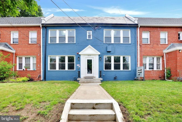 4019 9th St NE Unit 3, Washington, DC 20017 - view of front of house with brick siding and a front lawn