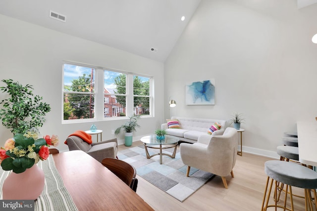 4019 9th St NE Unit 3, Washington, DC 20017 - living room with baseboards, high vaulted ceiling, light wood-style floors, and recessed lighting