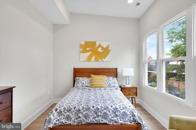 4019 9th St NE Unit 3, Washington, DC 20017 - bedroom with light wood-style floors and baseboards