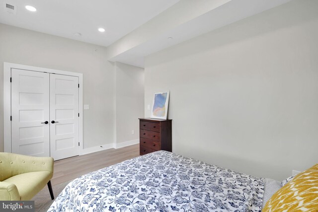 4019 9th St NE Unit 3, Washington, DC 20017 - bedroom with wood finished floors, recessed lighting, baseboards, and a closet