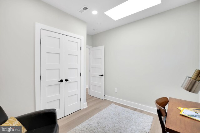 4019 9th St NE Unit 3, Washington, DC 20017 - home office featuring light wood-style floors, a skylight, baseboards, and recessed lighting