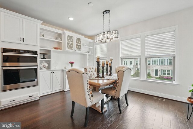 2069 Alder Ln, Dumfries, VA 22026 - dining space with a chandelier, dark wood-style flooring, baseboards, and recessed lighting