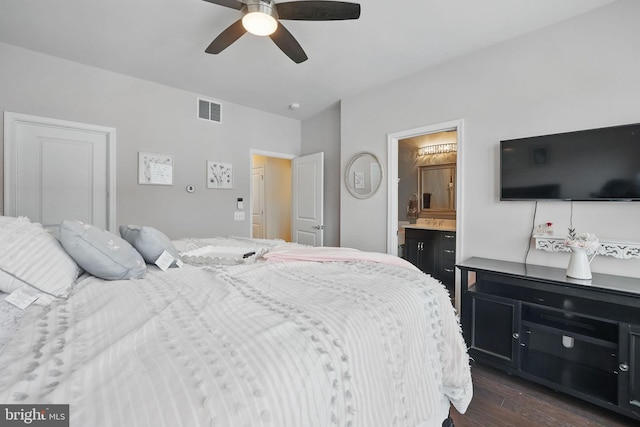2069 Alder Ln, Dumfries, VA 22026 - bedroom featuring dark wood-type flooring, connected bathroom, and ceiling fan