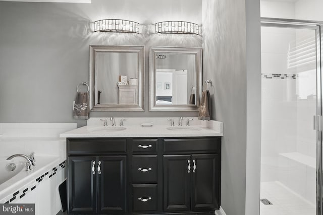 2069 Alder Ln, Dumfries, VA 22026 - bathroom featuring a shower stall, double vanity, and a bath