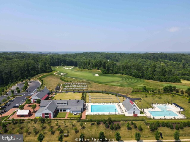 2069 Alder Ln, Dumfries, VA 22026 - bird's eye view of a pool, a heavily wooded area, and a golf club