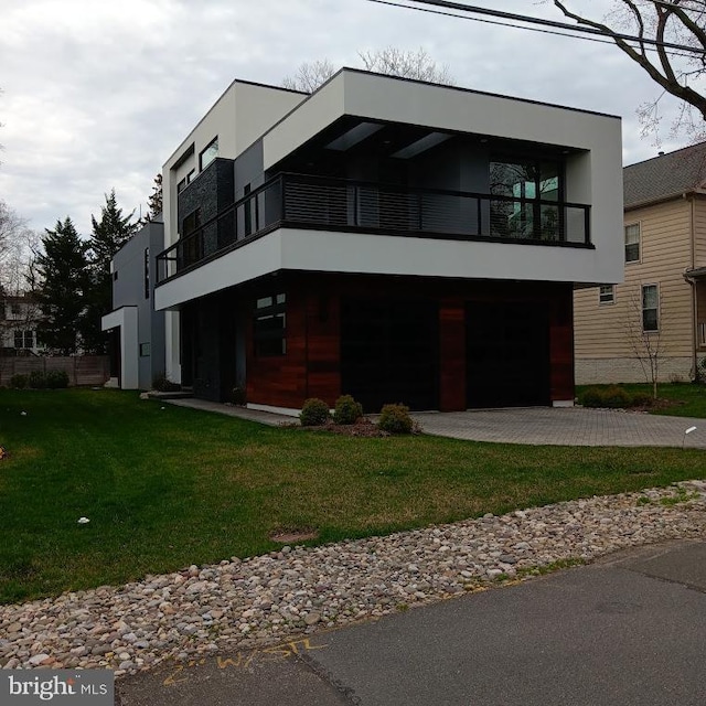 1519 Spring Vale Ave, Mclean, VA 22101 - contemporary house with stucco siding, a front lawn, a balcony, an attached garage, and driveway