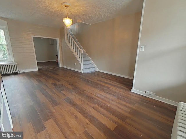 4019 N Marshall St, Philadelphia, PA 19140 - spare room featuring stairs, radiator, and wood finished floors