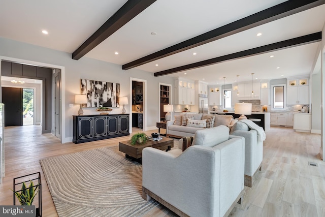 6800 Old Chesterbrook Rd, Mclean, VA 22101 - living room with plenty of natural light, beamed ceiling, light wood-style flooring, baseboards, and recessed lighting