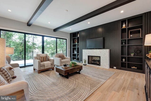 6800 Old Chesterbrook Rd, Mclean, VA 22101 - living room featuring a fireplace, beamed ceiling, light wood-type flooring, recessed lighting, and built in shelves