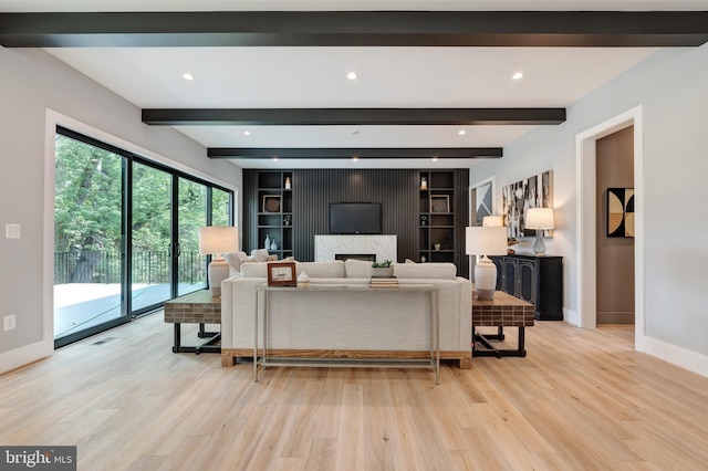 6800 Old Chesterbrook Rd, Mclean, VA 22101 - living room featuring baseboards, light wood finished floors, a fireplace, beam ceiling, and recessed lighting