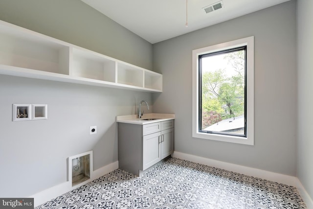 6800 Old Chesterbrook Rd, Mclean, VA 22101 - laundry room with electric dryer hookup, cabinet space, baseboards, and washer hookup