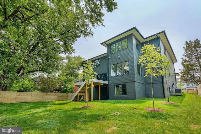 6800 Old Chesterbrook Rd, Mclean, VA 22101 - rear view of property featuring central AC, stairs, and a deck