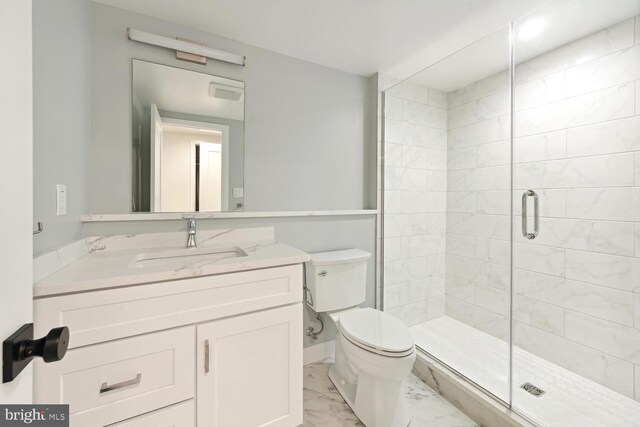 1850 Ingleside Ter NW Unit 2, Washington, DC 20010 - bathroom featuring marble finish flooring, toilet, vanity, and a shower stall
