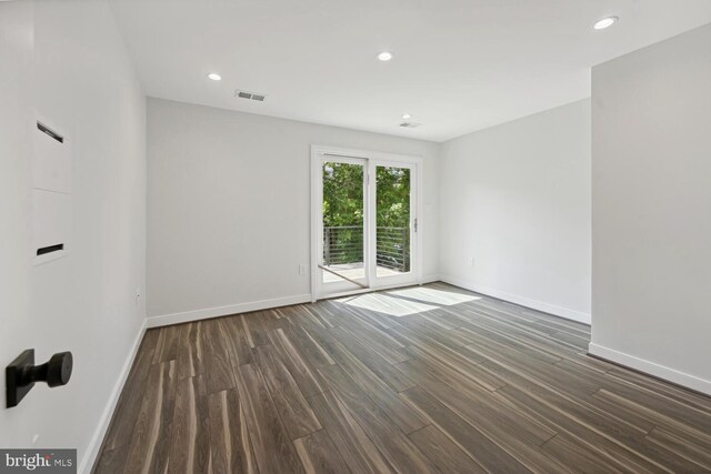 1850 Ingleside Ter NW Unit 2, Washington, DC 20010 - spare room featuring baseboards, dark wood-type flooring, and recessed lighting
