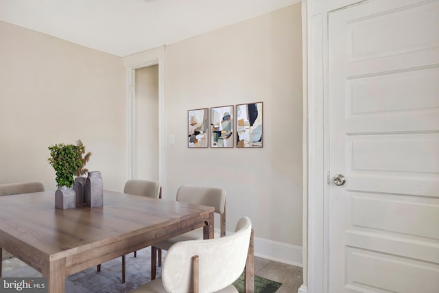 1003 Walnut Ave, Baltimore, MD 21229 - dining space featuring baseboards