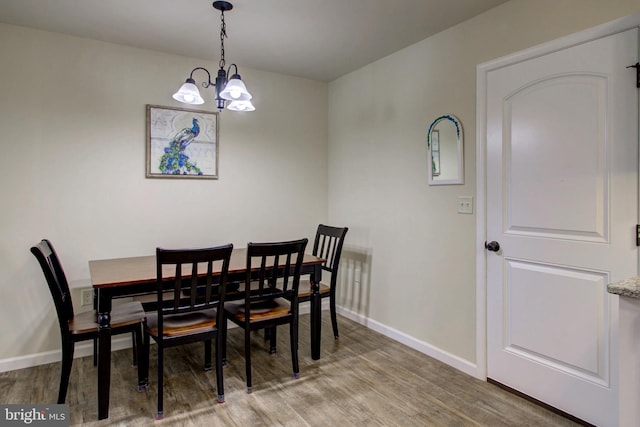 605 Byler Cir, Lebanon, PA 17042 - dining space featuring wood finished floors, a chandelier, and baseboards