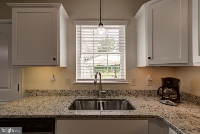 605 Byler Cir, Lebanon, PA 17042 - kitchen with a sink, dishwasher, light stone counters, white cabinets, and pendant lighting