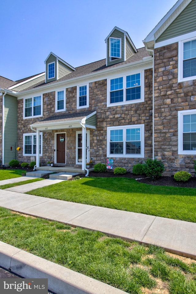 605 Byler Cir, Lebanon, PA 17042 - townhome / multi-family property with stone siding and a front lawn
