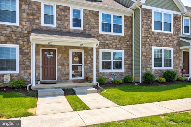605 Byler Cir, Lebanon, PA 17042 - view of property featuring stone siding, a front yard, and roof with shingles