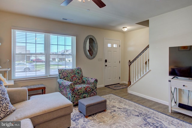 605 Byler Cir, Lebanon, PA 17042 - entrance foyer with stairs, wood finished floors, ceiling fan, and baseboards