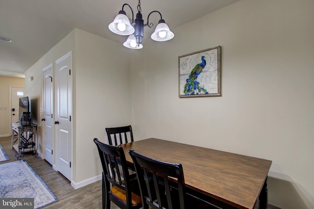 605 Byler Cir, Lebanon, PA 17042 - dining space featuring wood finished floors, a chandelier, and baseboards