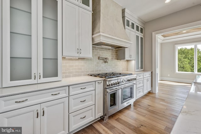 545 Webb Rd # Dd, Chadds Ford, PA 19317 - kitchen featuring custom range hood, double oven range, baseboards, light countertops, and recessed lighting