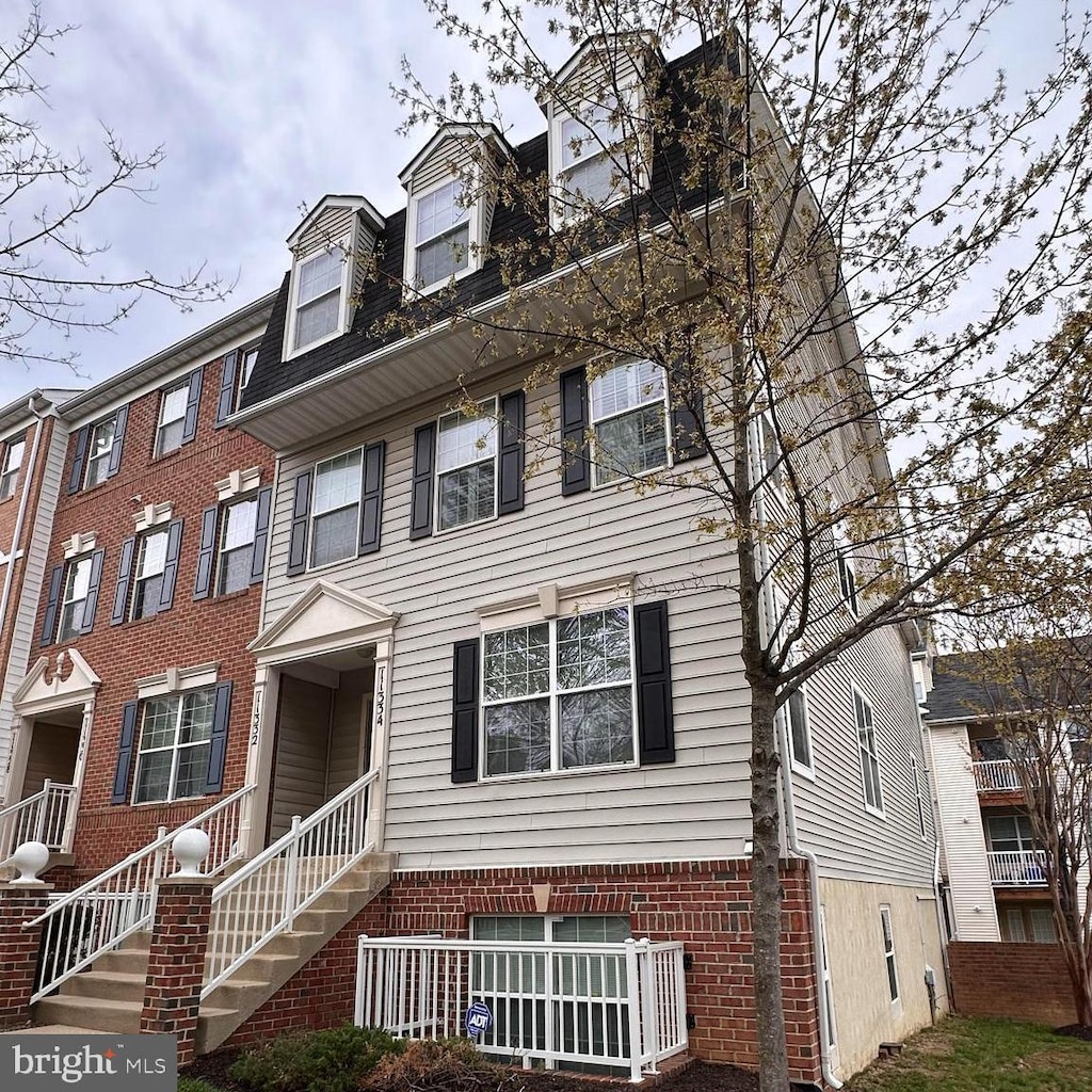 11334 King George Dr Unit 11, Wheaton, MD 20902 - view of property with brick siding