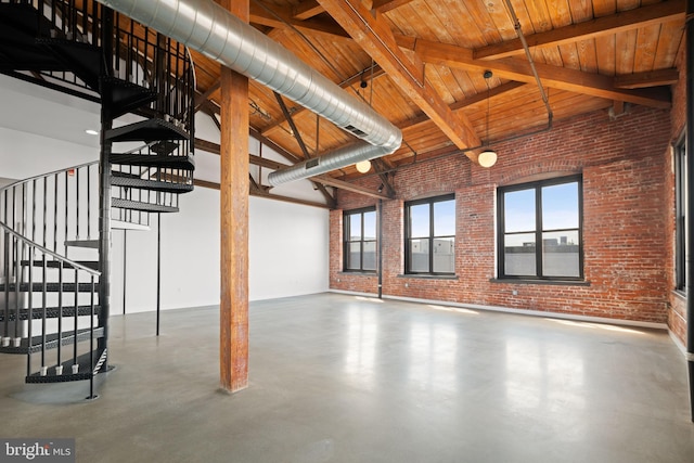 1147 N 4th St Unit 6F, Philadelphia, PA 19123 - basement featuring brick wall, stairway, and wood ceiling