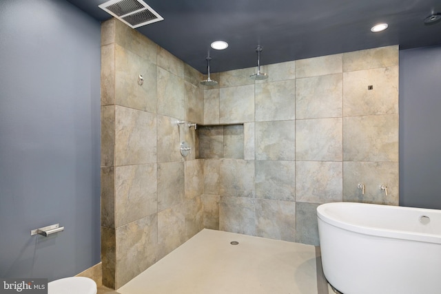 1147 N 4th St Unit 6F, Philadelphia, PA 19123 - full bathroom with a tile shower, a freestanding tub, and recessed lighting