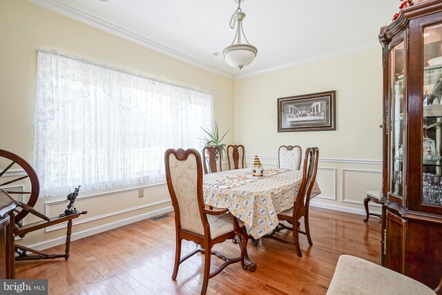 201 Morton, Rosenhayn, NJ 08352 - dining space featuring ornamental molding and light wood-style floors