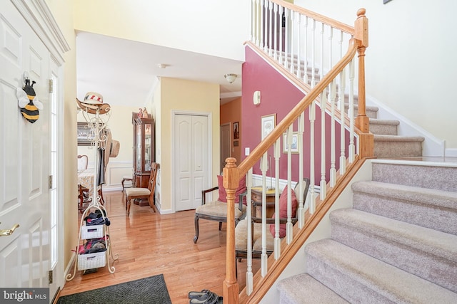 201 Morton, Rosenhayn, NJ 08352 - foyer featuring stairway, wood finished floors, a high ceiling, and baseboards