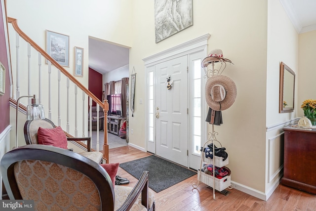 201 Morton, Rosenhayn, NJ 08352 - entryway with stairs, light wood finished floors, ornamental molding, baseboards, and a towering ceiling
