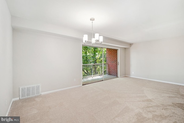 203 Cork Ln Unit 103, Reisterstown, MD 21136 - carpeted empty room featuring a chandelier and baseboards