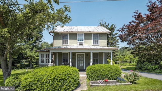 404 Clear Ridge Rd, Union Bridge, MD 21791 - view of front of house with a standing seam roof, a porch, and metal roof