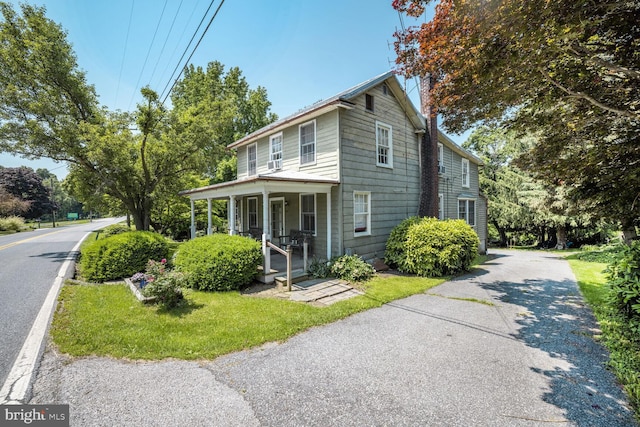 404 Clear Ridge Rd, Union Bridge, MD 21791 - view of front facade with a porch and asphalt driveway