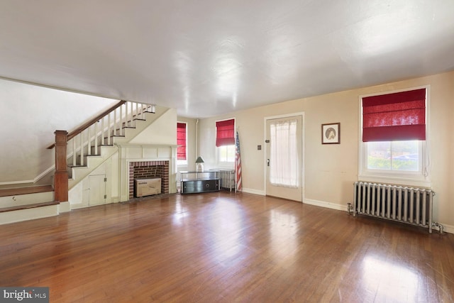404 Clear Ridge Rd, Union Bridge, MD 21791 - living room with radiator, healthy amount of natural light, and wood finished floors