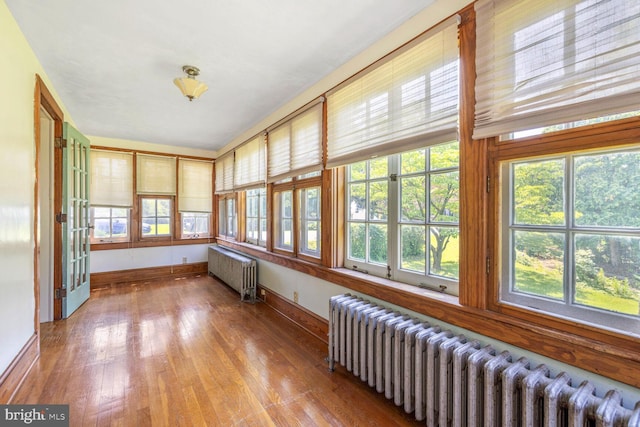 404 Clear Ridge Rd, Union Bridge, MD 21791 - sunroom / solarium with radiator, baseboards, and hardwood / wood-style floors
