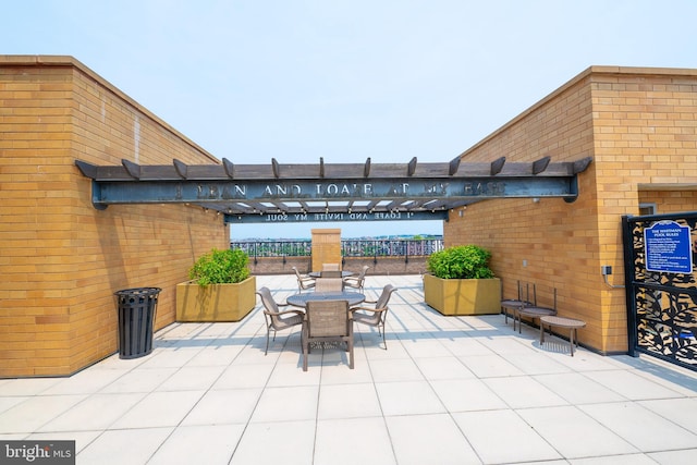 910 M St NW Unit 1022, Washington, DC 20001 - view of patio with outdoor dining space and a pergola
