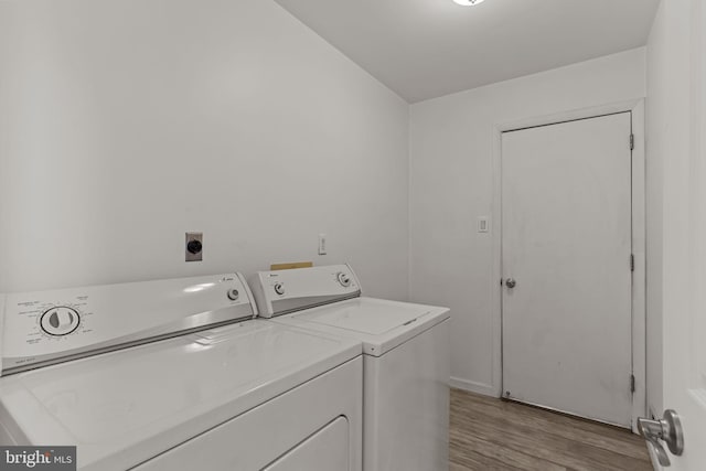 1040 Muscovy Ln, Bensalem, PA 19020 - laundry room with washer and dryer and light wood-style flooring